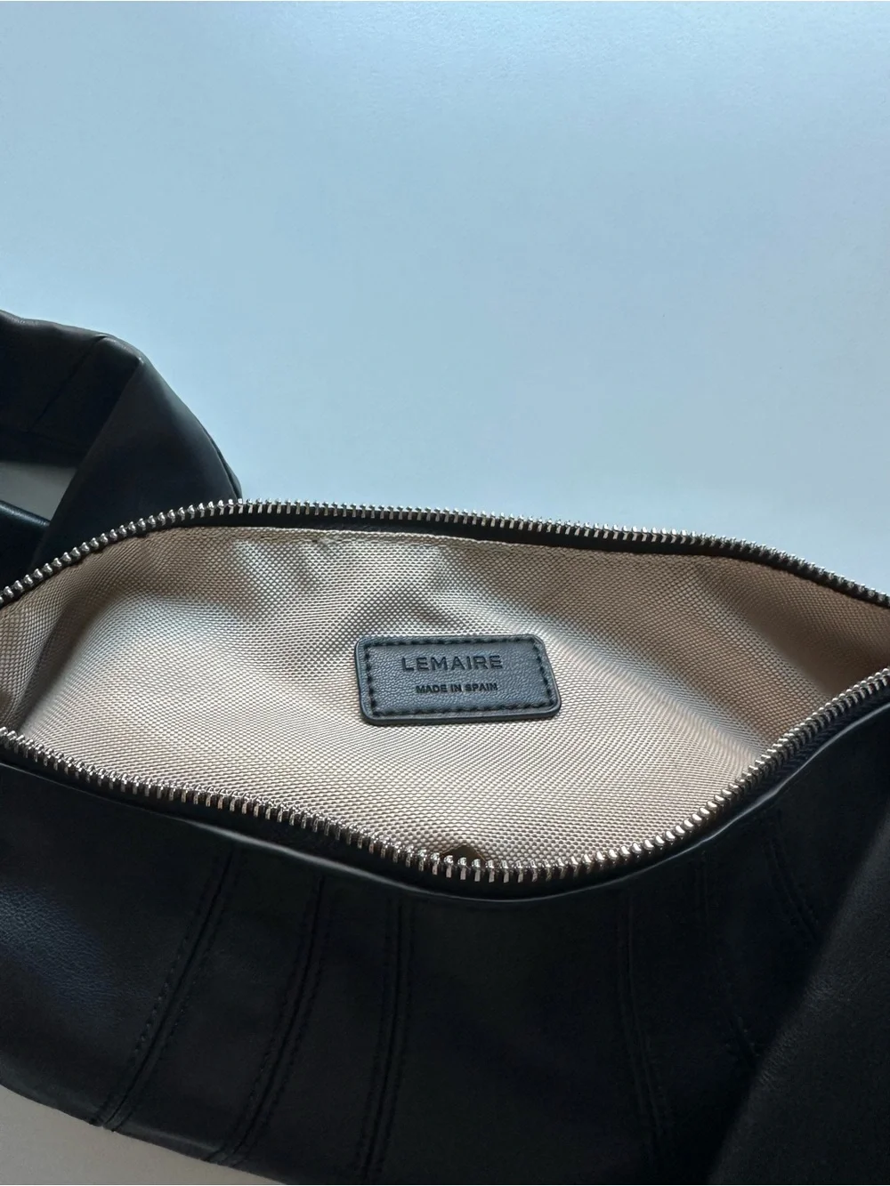 Black croissant bag
